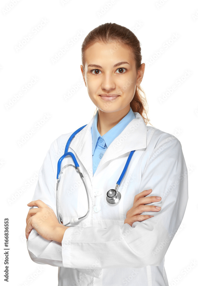 Young female doctor with stethoscope on white background