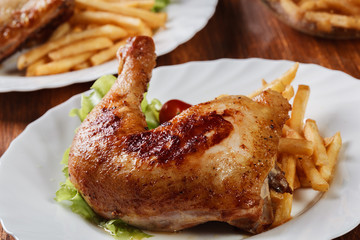 Sticker - Roasted chicken legs with french fries and lettuce