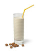 Glass Horchata milk and shelled chufa nuts