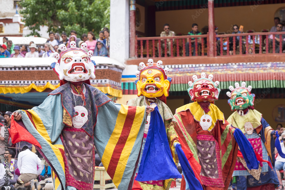 Leh Ladakh,India - July 3:The mask dancing performed by the Lamas in a Hemis festival in Hemis monastery on July 3, 2017 , Leh Ladakh , India. - obrazy, fototapety, plakaty 
