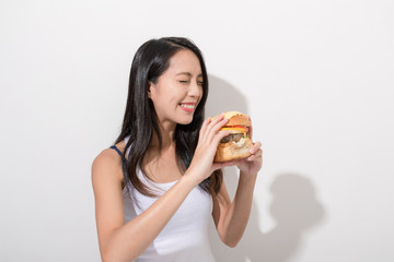 Canvas Print - Woman enjoy burger