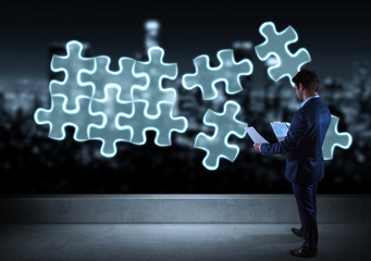 Poster - Businessman searching puzzle solution on a rooftop 3D rendering