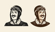 Portrait of smiling pilot or racer. Vintage sketch vector illustration