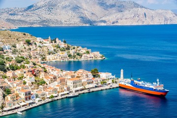 Wall Mural - Cityscape of a picturesque Symi town, capital of Symi island, Greece