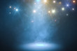 © vchalup - Podium with smoke and blue light. 3D rendered illustration.