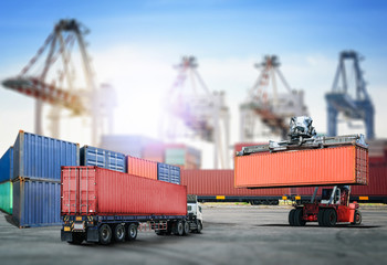 Logistics import export background and transport industry of forklift handling container box loading at port