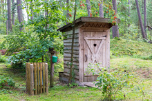 Wooden WC In The Forest