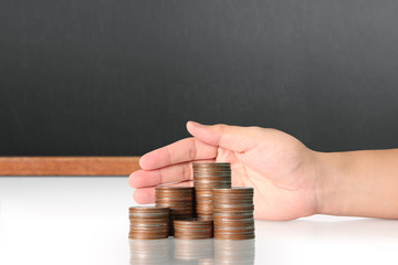  money growing from coins in hand