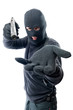 Armed robber requires money and aims at the camera