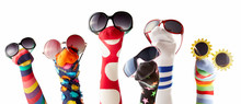 Sock Puppets With Glasses Against White Background
