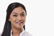 © IndiaPix - Portrait of an attractive mid adult woman over white background
