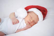 Cute Newborn Baby With Santa Hat