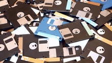 Obsolete Floppy Disks On Office Desk