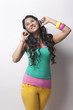 © IndiaPix - Young woman listening to music