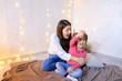 © sisterspro - Communication of older female sister with youngest girl who spen