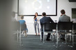 © ReeldealHD images - Businesswoman giving training to colleagues in conference room