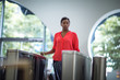 © ReeldealHD images - Woman walking through security turnstile in office