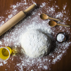 Preparation for baking bread - kneading dough in your home kitchen