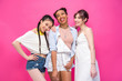 © LIGHTFIELD STUDIOS - happy young multiethnic women smiling at camera while standing together isolated on pink