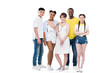 © LIGHTFIELD STUDIOS - group of happy young multiethnic people smiling at camera while standing together isolated on white
