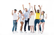 © LIGHTFIELD STUDIOS - group of happy young multiethnic people triumphing and smiling at camera isolated on white