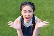 © LIGHTFIELD STUDIOS - portrait of surprised asian girl gesturing with hands and looking at camera