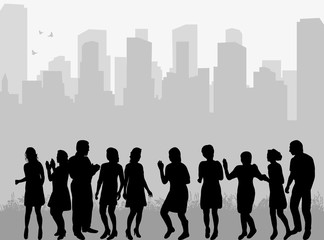 Wall Mural - silhouette of a crowd of people dancing against a city background