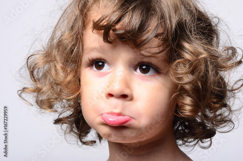 Portrait Of A Beautiful Sad Boy Toddler Feeling Sadness