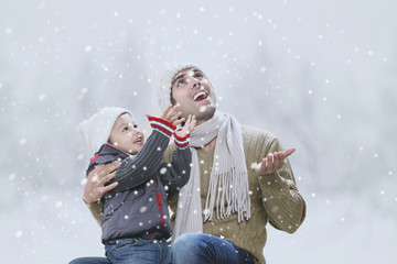 Father and son enjoying winter 