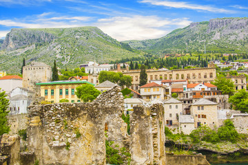 Wall Mural - A beautiful view of the Neretva River in Mostar, Bosnia and Herzegovina, on a sunny summer day