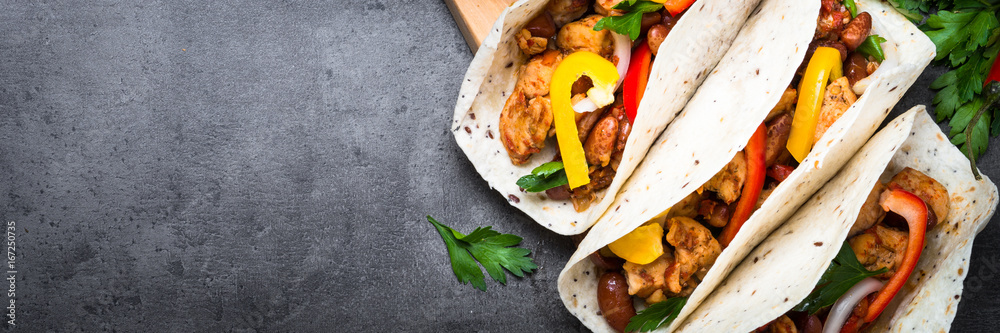 Mexican taco with meat beans and vegetables. Long banner format. - obrazy, fototapety, plakaty 