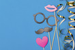 Party props on a blue background. Birthday, wedding party celebration