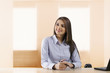 © IndiaPix - Businesswoman sitting in an office