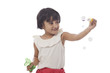 © IndiaPix - Little girl making bubbles