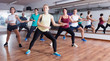 © JackF - Cheerful beginner dancers learning  zumba elements