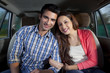 © IndiaPix - Young man and young woman sitting in a car