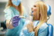 © grki - Woman in Dentist Office