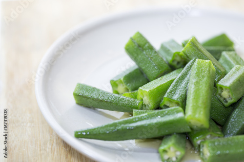 Fototapeta na szkło Traditional Chinese food, okra with oyster sauce.