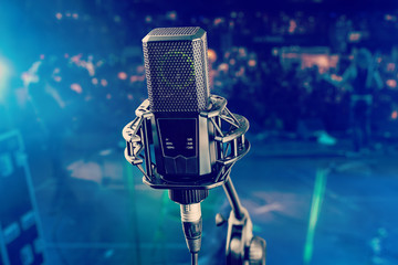 Wall Mural - Professional studio microphone on stage during rock concert