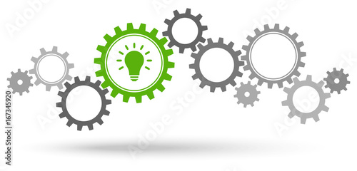 Cuadros en Lienzo gray gears with green light bulb