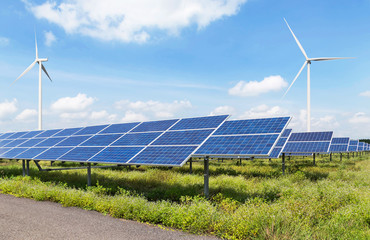 Wall Mural - solar panels and wind turbines generating electricity in power station alternative renewable energy 