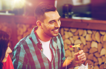 Sticker - happy man having dinner at restaurant