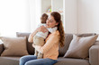 © Syda Productions - happy young mother hugging little baby at home