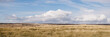 © Liam Grant Photography/Stocksy - Blue sky and white clouds above sunlit moorland. Derbyshire, UK.