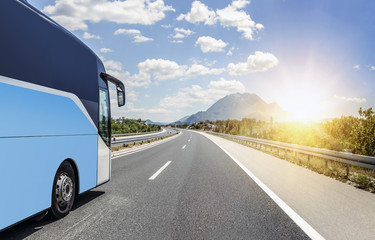 bus rushes along the asphalt high-speed highway.