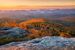 Scenic sunrise over fall foliage, Blue Ridge Mountains, North Carolina.