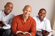 © digitalskillet1 - Diverse group of men studying together.