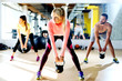 © Dusan Petkovic - Young group having functional fitness training with a kettlebell in sports gym.