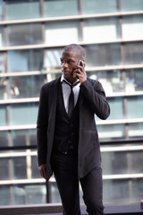 Wall Mural - portrait of a young Confident afro american  businessman outdoor 