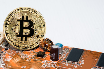 close up of Bitcoin money mining on graphic card,we see the technology of the mainboard,which is the important background of the computer.